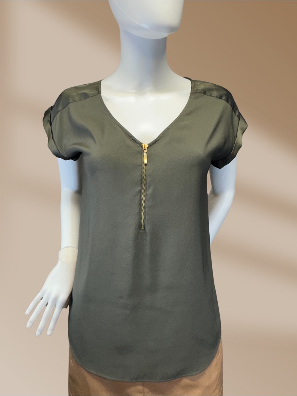 Express ladies top is a Olive green satiny blouse in size small petite